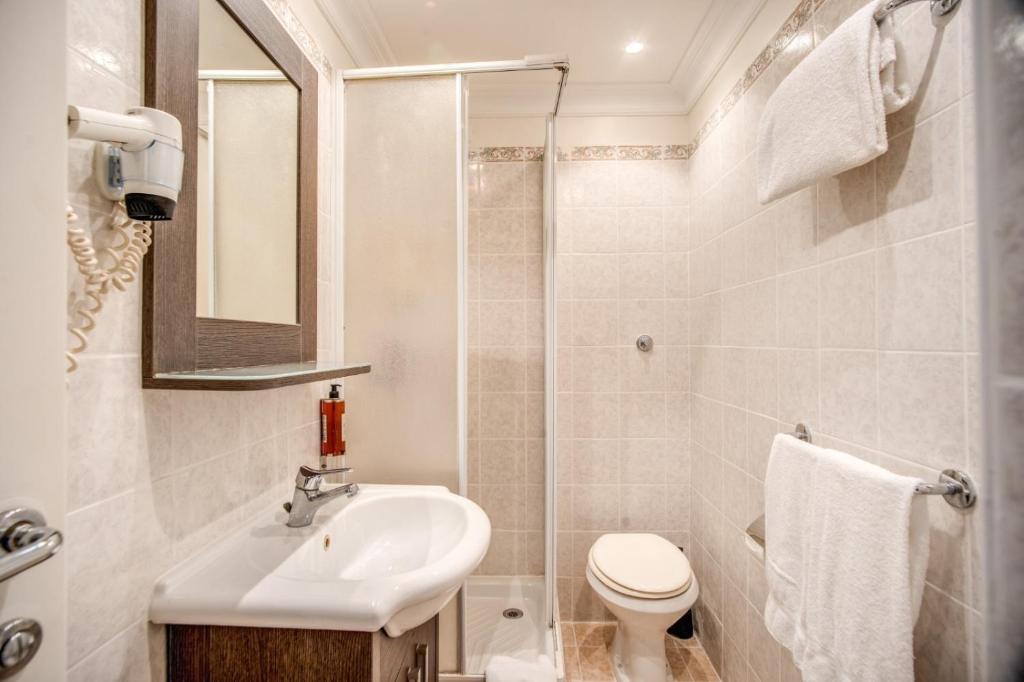 Koupelna v ubytování Hotel Mirti