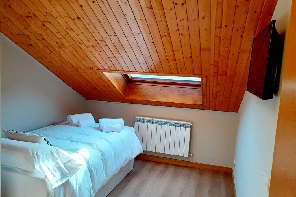 Postel nebo postele na pokoji v ubytování Adosado Marblés con Txoko y Wifi