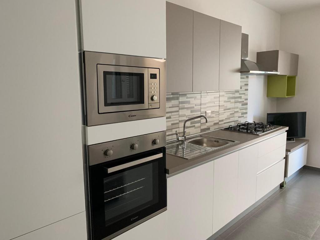 Η κουζίνα ή μικρή κουζίνα στο Villa Agamennone