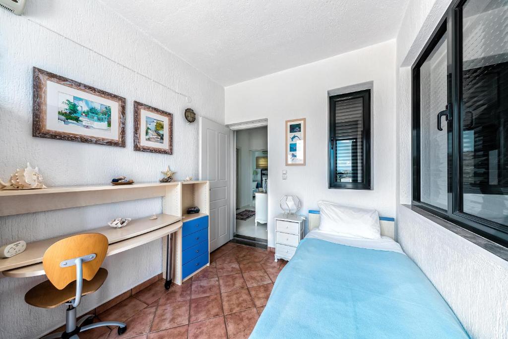 Postel nebo postele na pokoji v ubytování Villa Artemis
