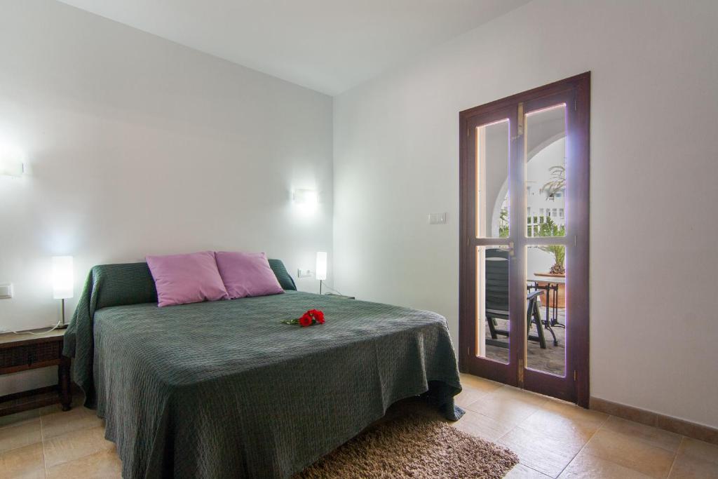 Postel nebo postele na pokoji v ubytování Villa Comes