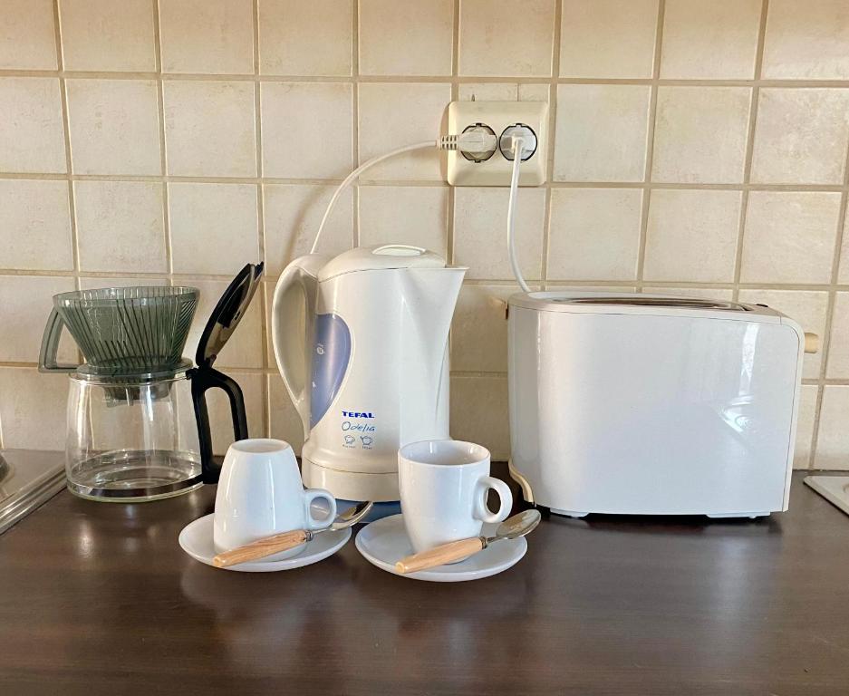 Příslušenství pro přípravu čaje a kávy v ubytování Penélope Hotel