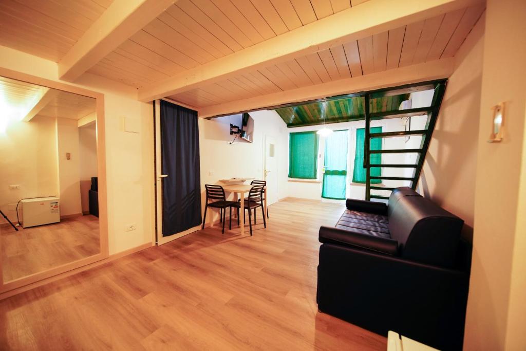 TV a/nebo společenská místnost v ubytování Hotel Capo Di Stella