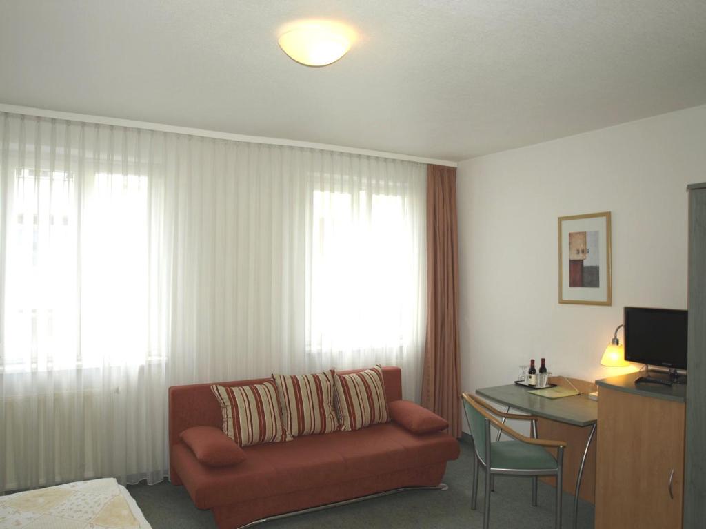 TV a/nebo společenská místnost v ubytování Central-Classic Hotel