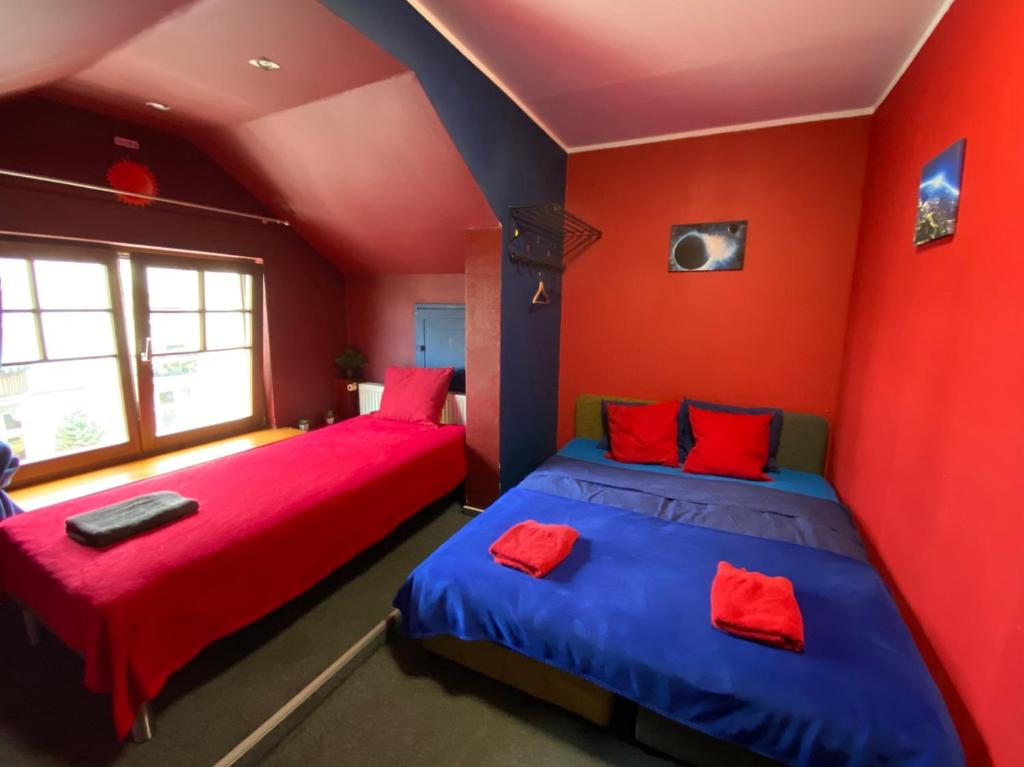 Posteľ alebo postele v izbe v ubytovaní Hostel Galaxy