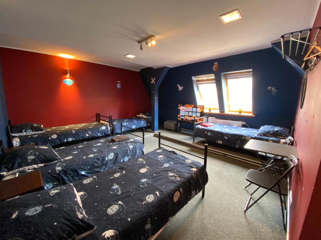 Posteľ alebo postele v izbe v ubytovaní Hostel Galaxy