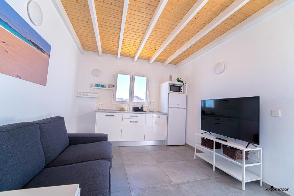 Kuchyňa alebo kuchynka v ubytovaní Apartamentos Anjomacar A