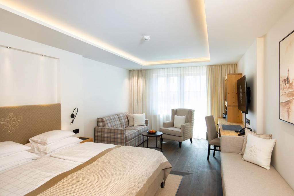 Letto o letti in una camera di Hotel Grünauerhof