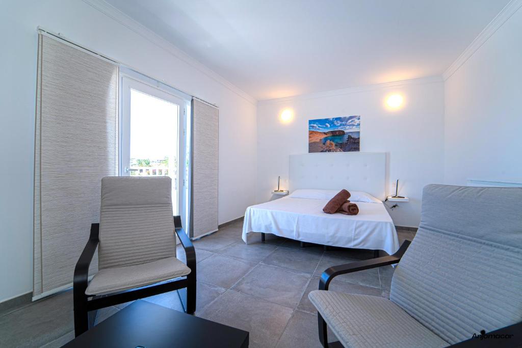 Posedenie v ubytovaní Apartamentos Anjomacar A