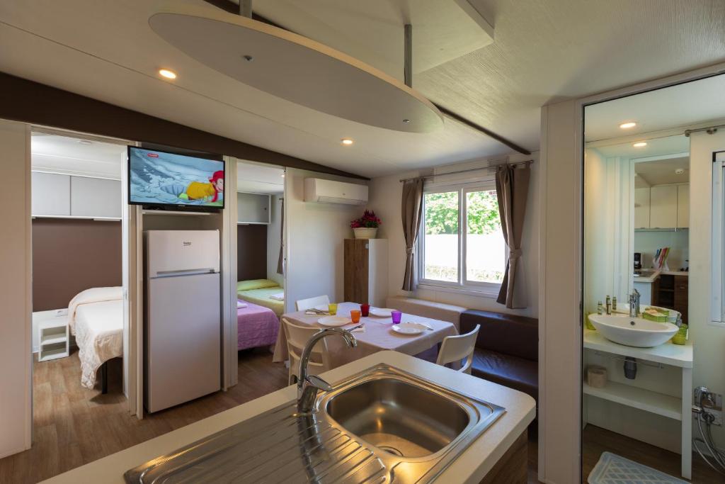 Postel nebo postele na pokoji v ubytování Agriturismo L'Acero Rosso