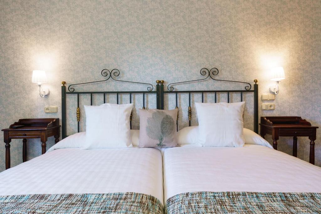 Postel nebo postele na pokoji v ubytování Lar da Mota Boutique Hotel