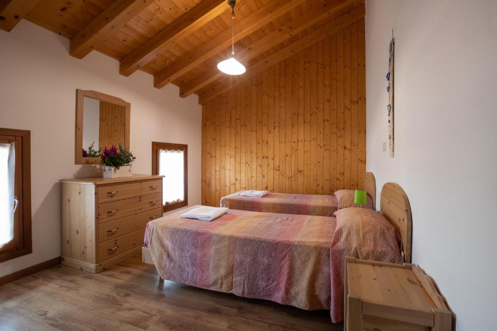 Postel nebo postele na pokoji v ubytování Agriturismo L'Acero Rosso