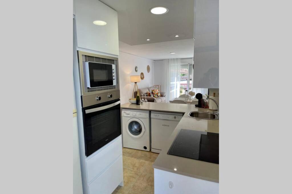 A kitchen or kitchenette at Holiday apartment