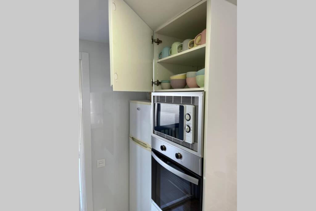 A kitchen or kitchenette at Holiday apartment