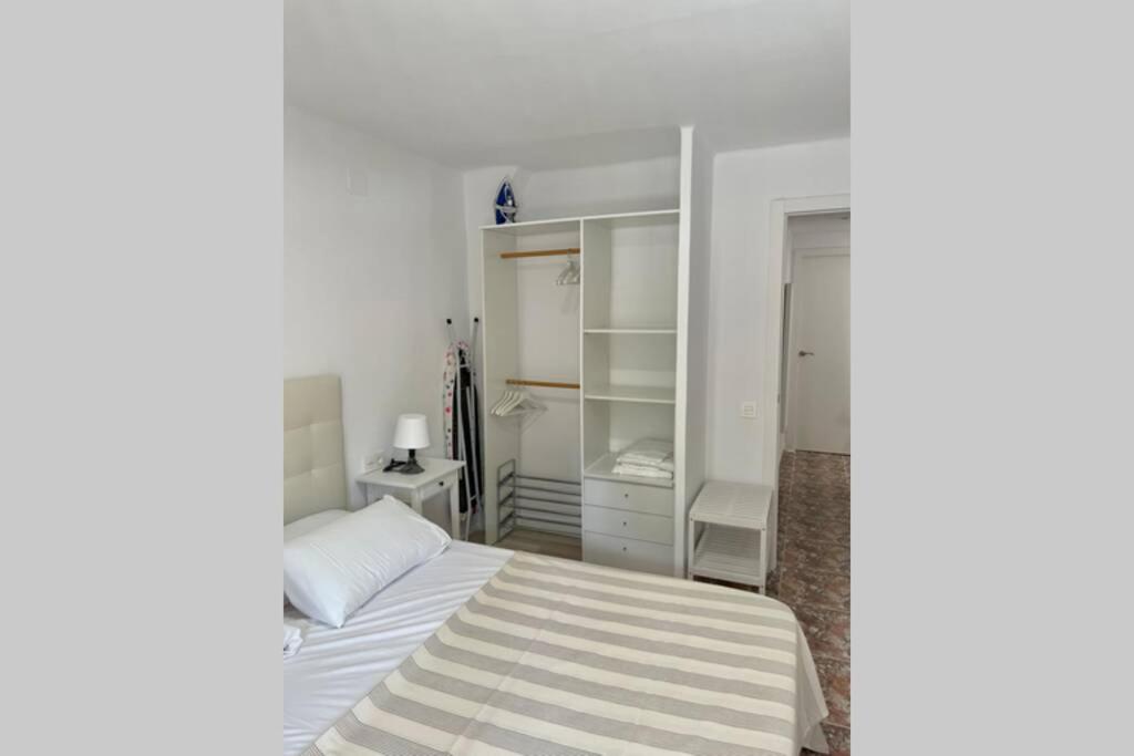 A bed or beds in a room at Holiday apartment