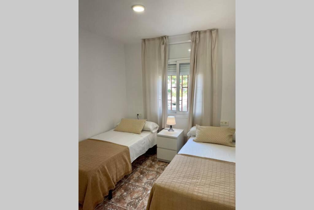 A bed or beds in a room at Holiday apartment
