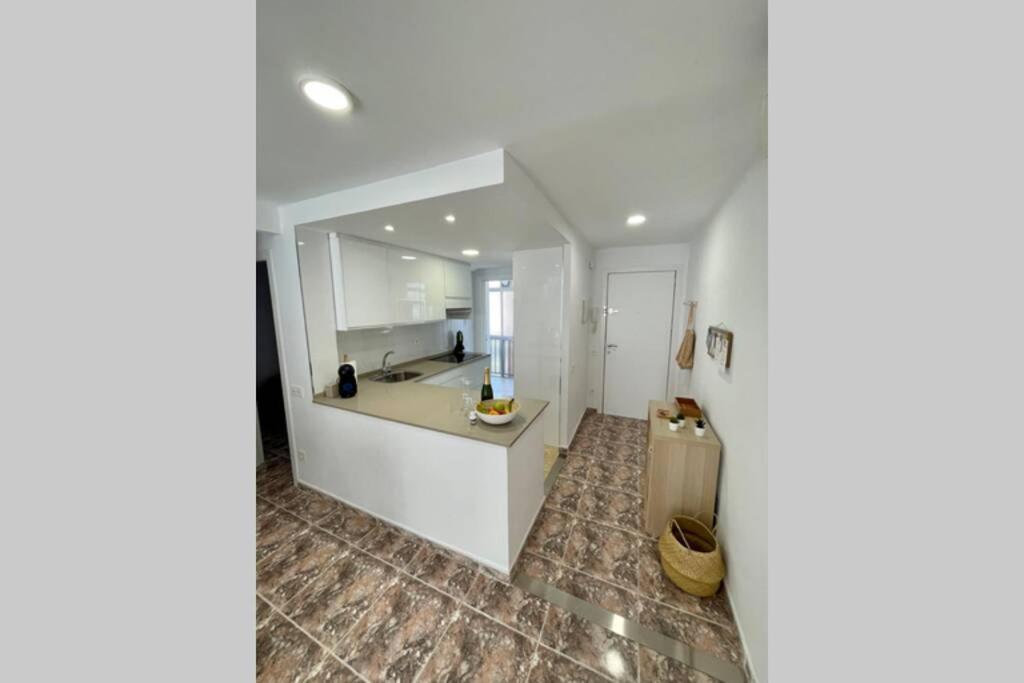 A kitchen or kitchenette at Holiday apartment