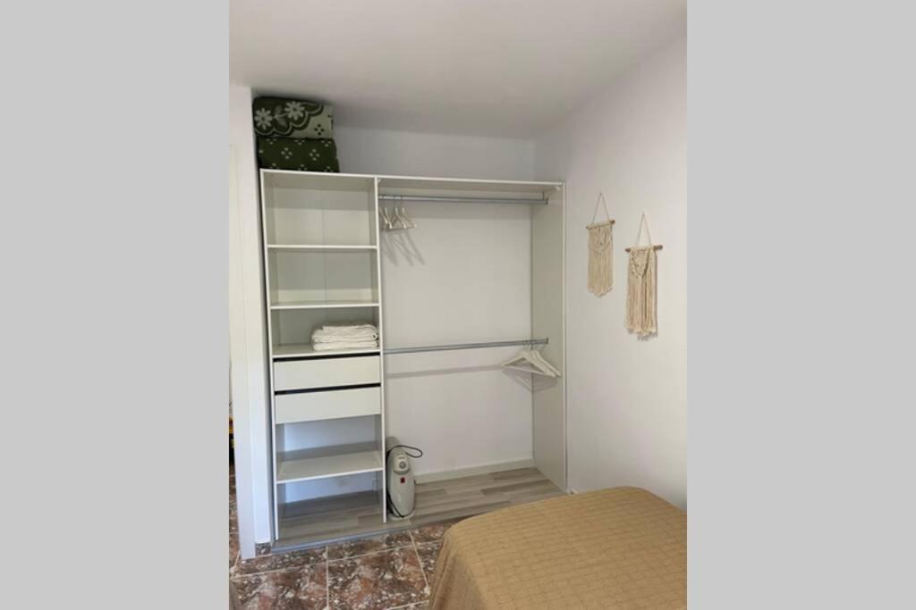 A bed or beds in a room at Holiday apartment