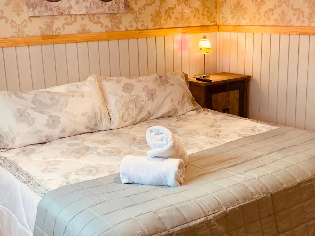 Postel nebo postele na pokoji v ubytování Arte Brisa Hostal Boutique