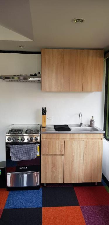 Kuchyň nebo kuchyňský kout v ubytování El Hostel Granjero