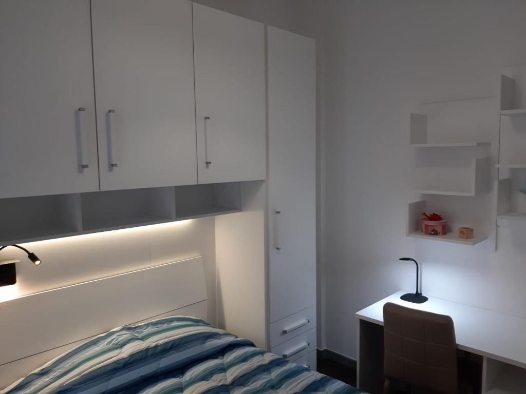 Кровать или кровати в номере Appartamento appena ristrutturato