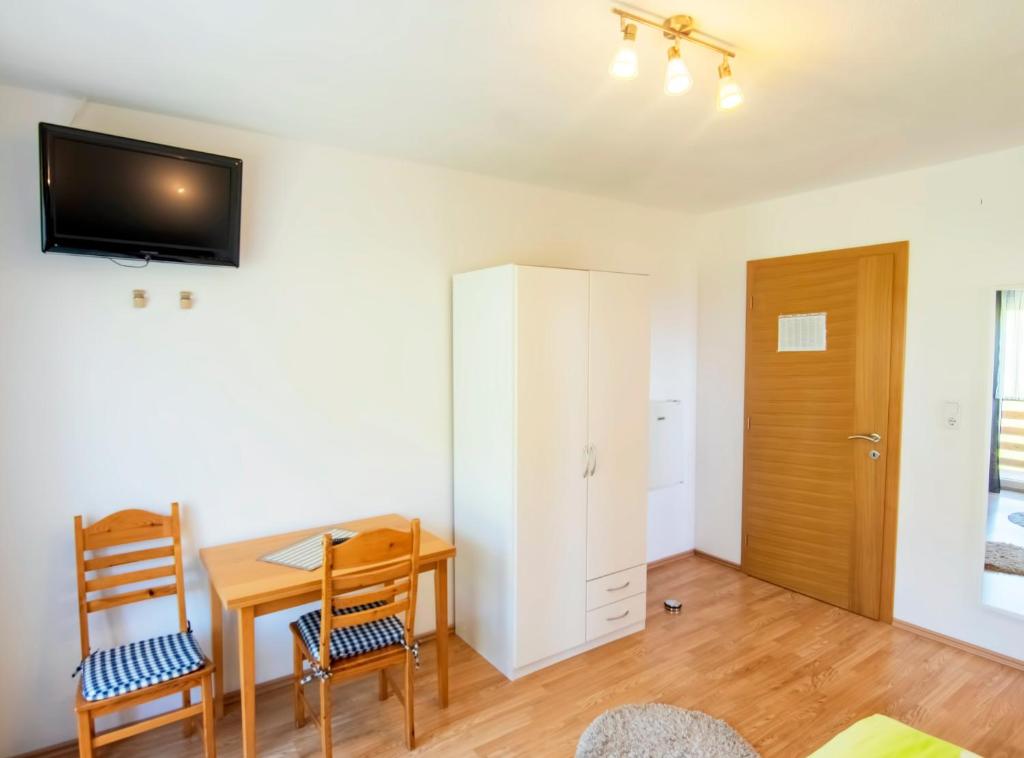TV a/nebo společenská místnost v ubytování Soul Vacation