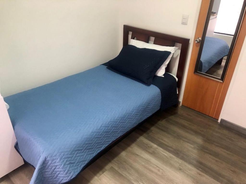 Cama o camas de una habitación en Apto Privado cerca al Aeropuerto -Transporte disponible