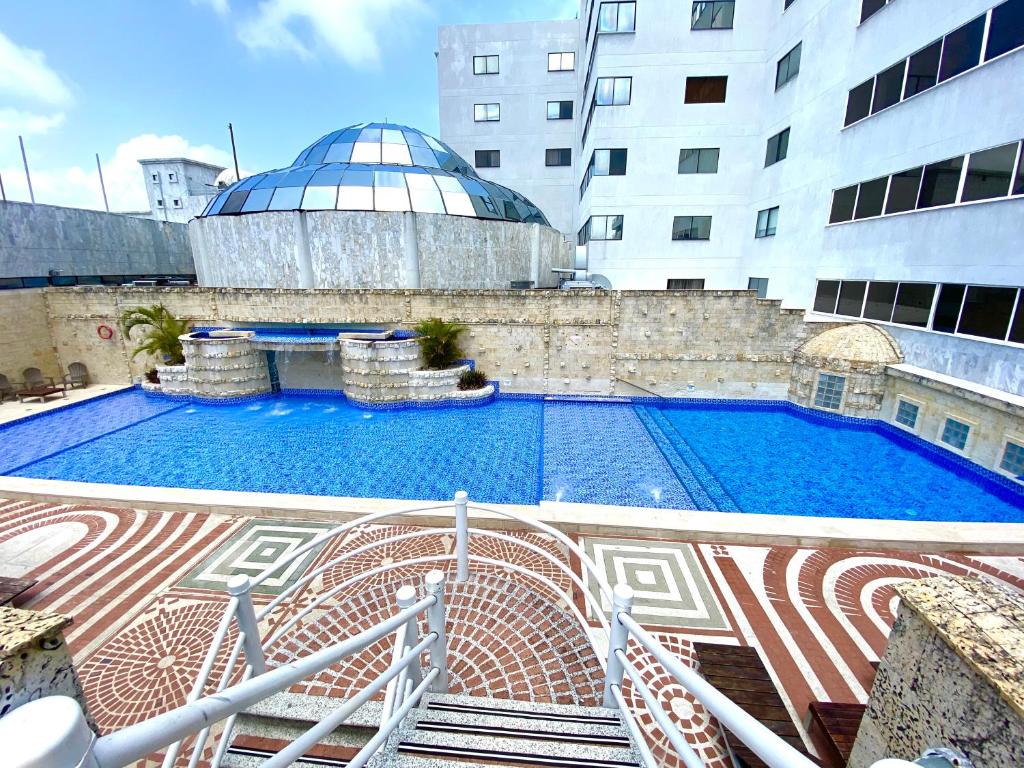 Bazén v ubytování Exclusivos Apartamentos con playa privada nebo v jeho okolí