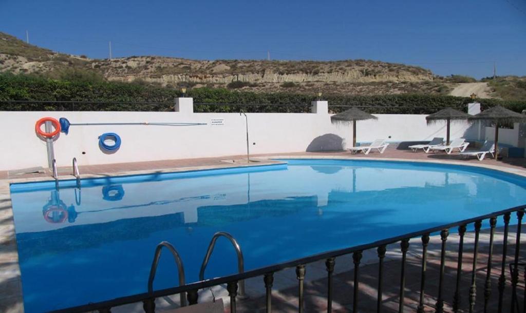 Bazén v ubytování Apt on the ground floor, with a large terrace, two bedrooms and Ac nebo v jeho okolí