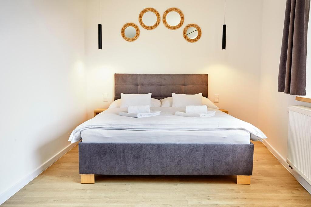 Posteľ alebo postele v izbe v ubytovaní Apartmány LAMA