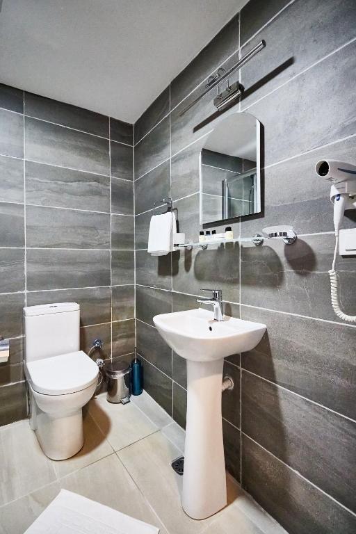 Koupelna v ubytování Kumru Hotel
