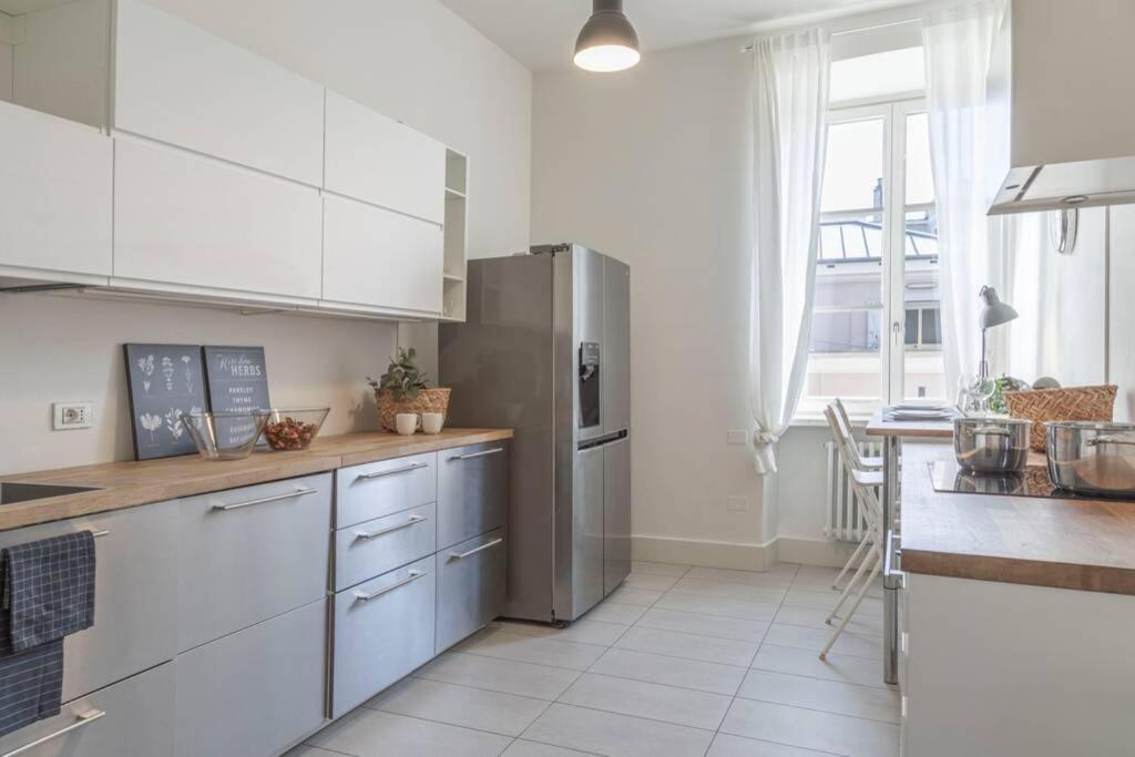 Kuchyňa alebo kuchynka v ubytovaní Palazzo Tergesteo Tirabora Suite Apartments