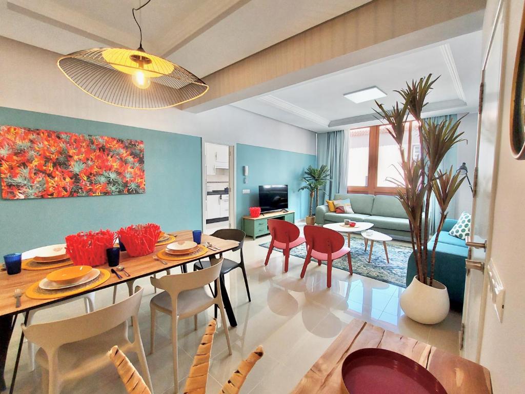Televízia a/alebo spoločenská miestnosť v ubytovaní Aromas Suites Apartments