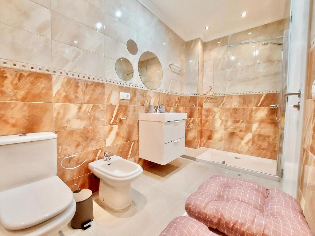 Kúpeľňa v ubytovaní Aromas Suites Apartments