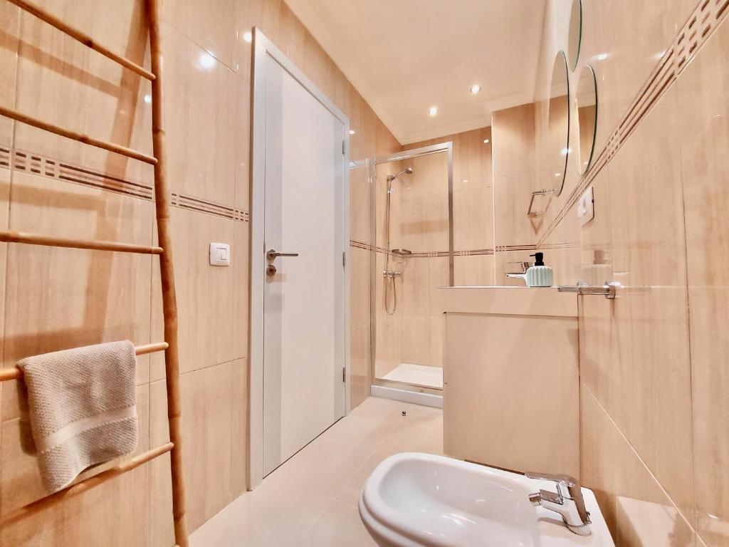 Kúpeľňa v ubytovaní Aromas Suites Apartments