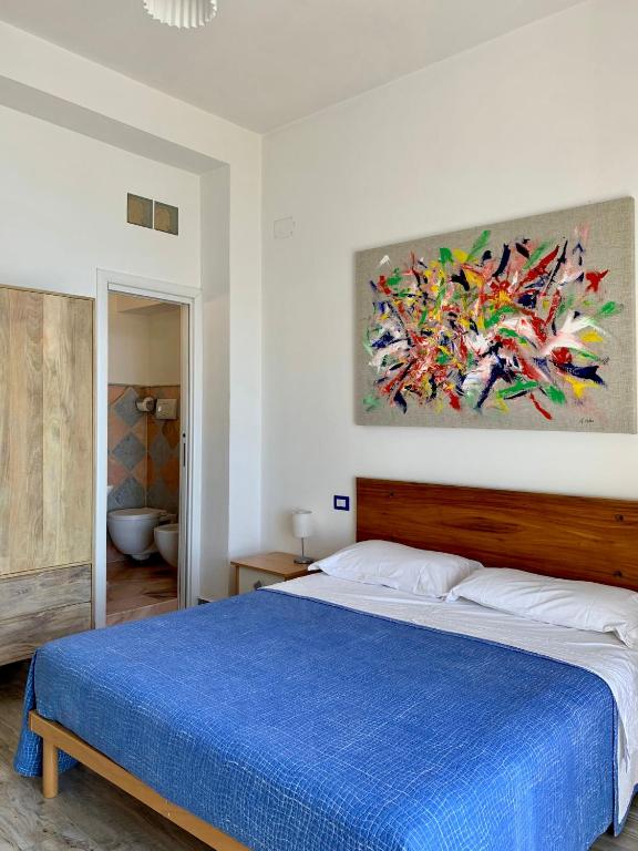 Postel nebo postele na pokoji v ubytování B&B Mare Blu