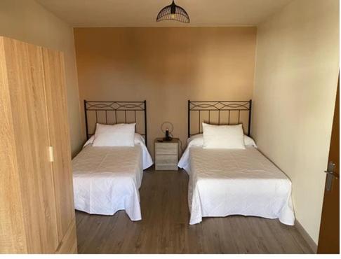 Postel nebo postele na pokoji v ubytování Casa Tijeras I