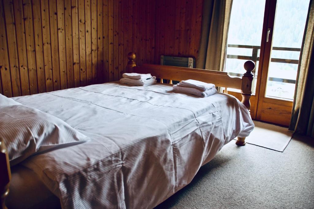 Postel nebo postele na pokoji v ubytování Chalet Le Jeuna