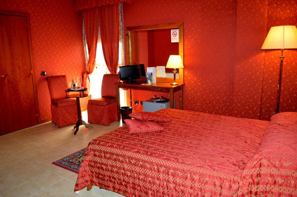 Postel nebo postele na pokoji v ubytování Hotel Shasa