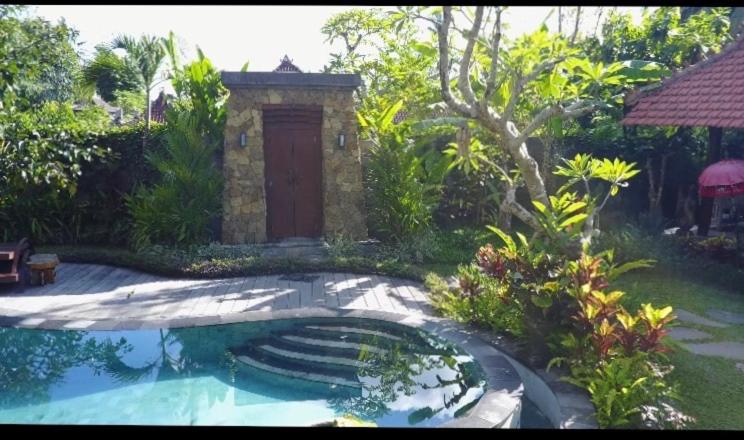 Bazén v ubytování Villa Sindu Ubud nebo v jeho okolí