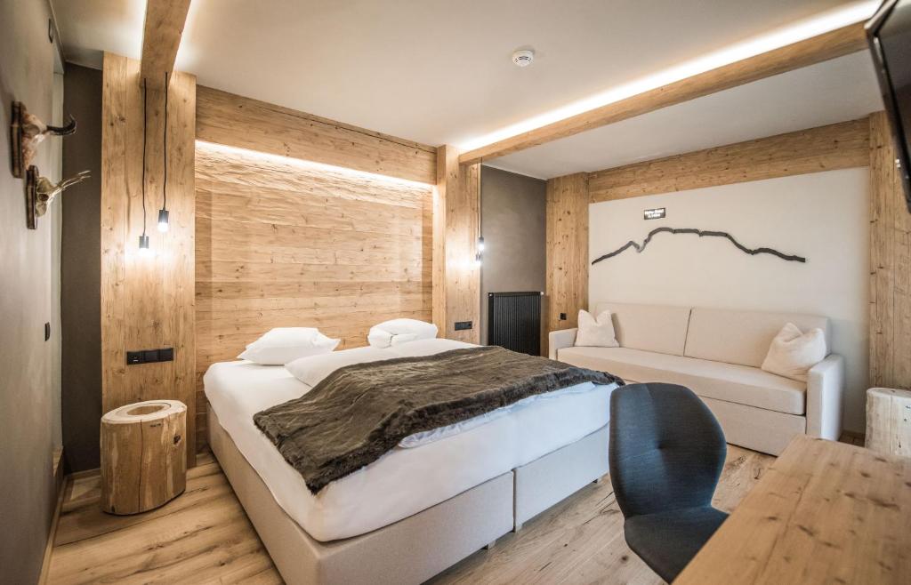 Postel nebo postele na pokoji v ubytování Hotel Edelweiss