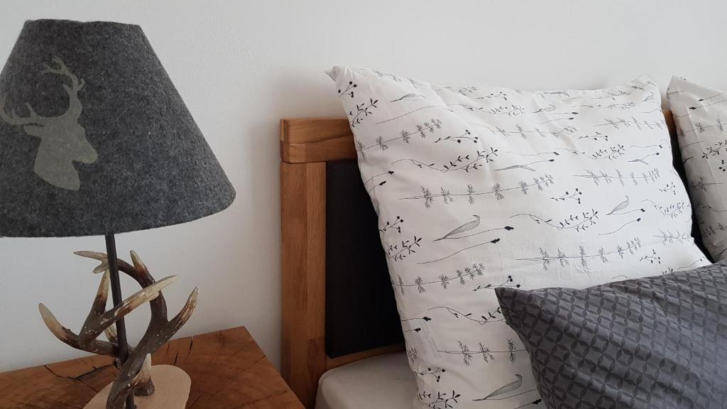 A bed or beds in a room at Gästehaus Sabine