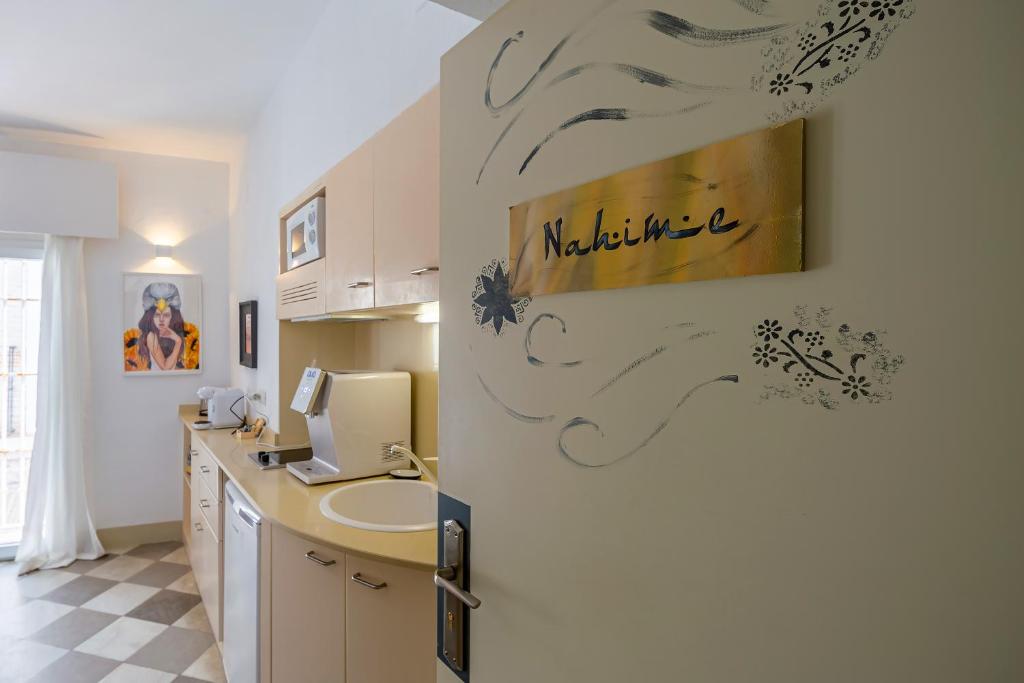 a bathroom with a sink and a toilet at La Casa de la Favorita in Tarifa