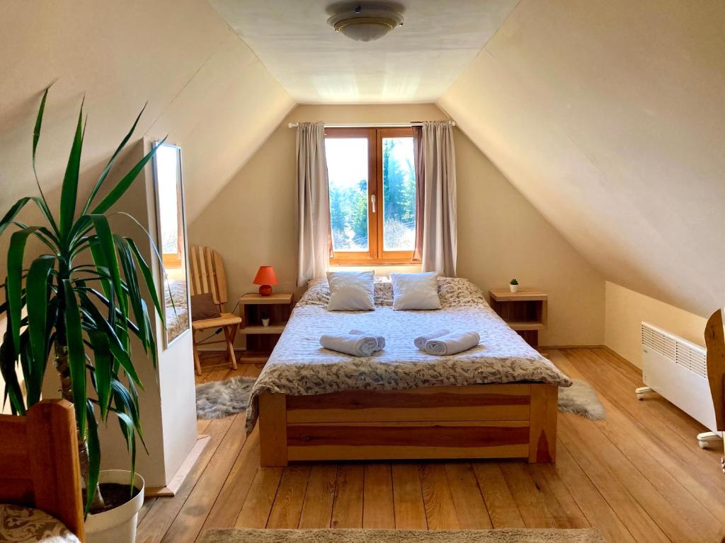 Llit o llits en una habitació de Planinska Koliba Sekulić