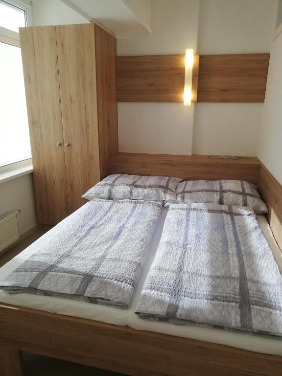 Postel nebo postele na pokoji v ubytování Ferienwohnung Maria