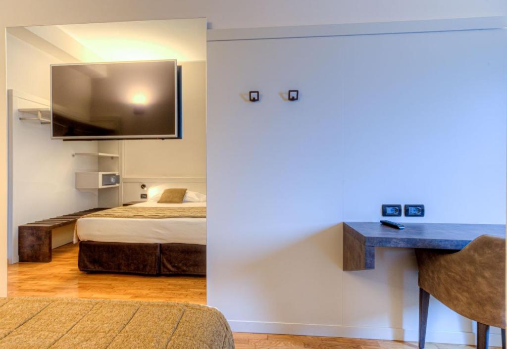Postel nebo postele na pokoji v ubytování Hotel Belvedere Thiene