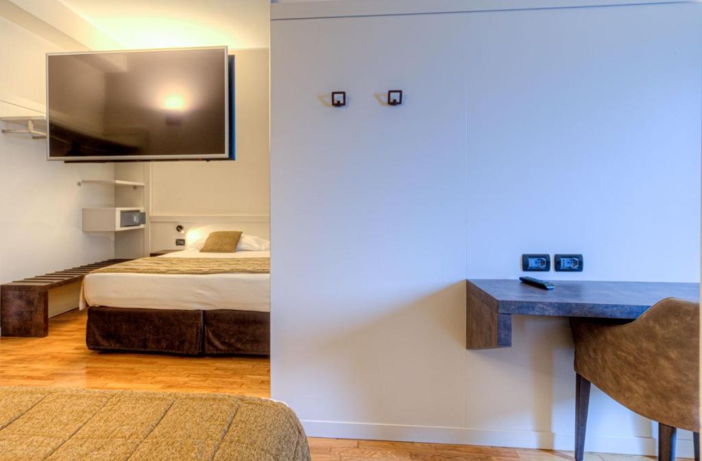 Postel nebo postele na pokoji v ubytování Hotel Belvedere Thiene