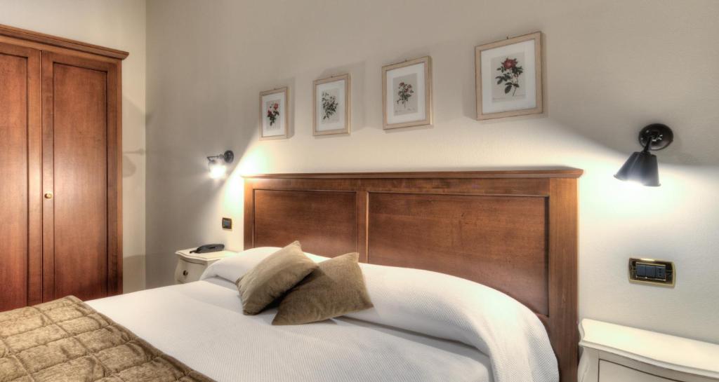 Postel nebo postele na pokoji v ubytování Hotel Belvedere Thiene
