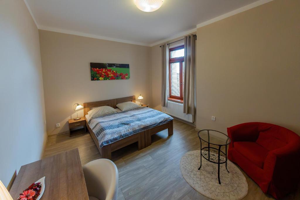Postel nebo postele na pokoji v ubytování Penzion Apartmány Resident