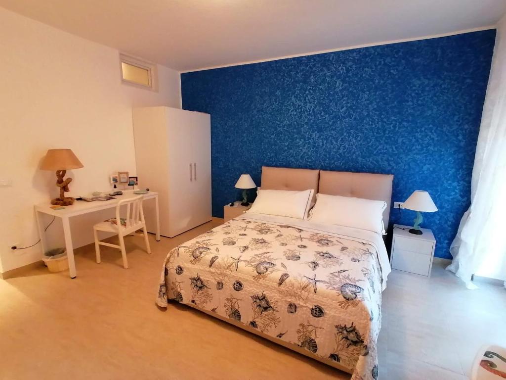 Postel nebo postele na pokoji v ubytování L'approdo